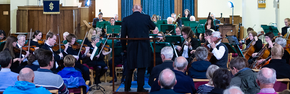 Picture of SPO with conductor Mark Fitz-Gerald, playing Balakirev’s
    Overture on Three Russian Themes